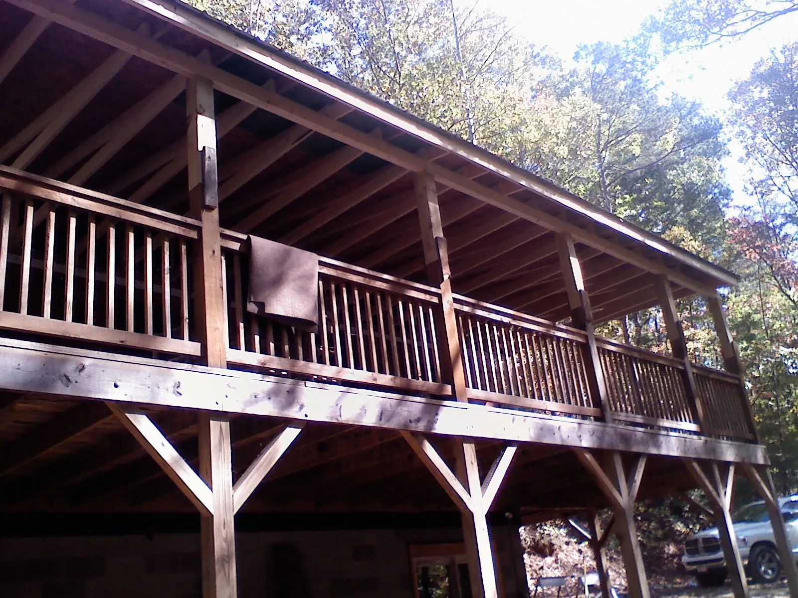 Timber framing under a new elevated porch and deck — Roof Leak Repair in Miami by Roofing Brothers